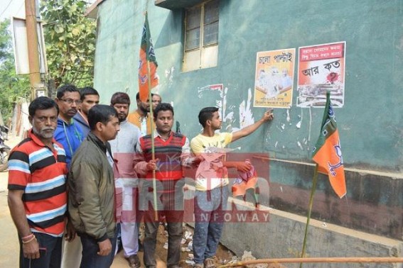 Political jealousies continue : BJP's flags, festoons damaged ahead of Amit Shah's arrival Political jealousies continue : BJP's flags, festoons damaged ahead of Amit Shah's arrival
